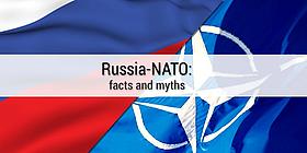 Die Flaggen von Russland und der NATO 