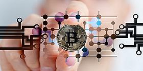 Bitcoin zwischen den Fingern, Kryptowährung