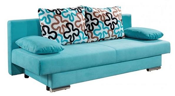 blaues Sofa, bunte Kissen mit Blumenmuster