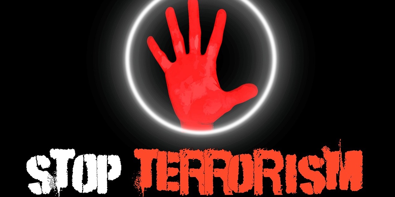 Rote Hand darunter der Schriftzug "Stoppt Terrorismus"