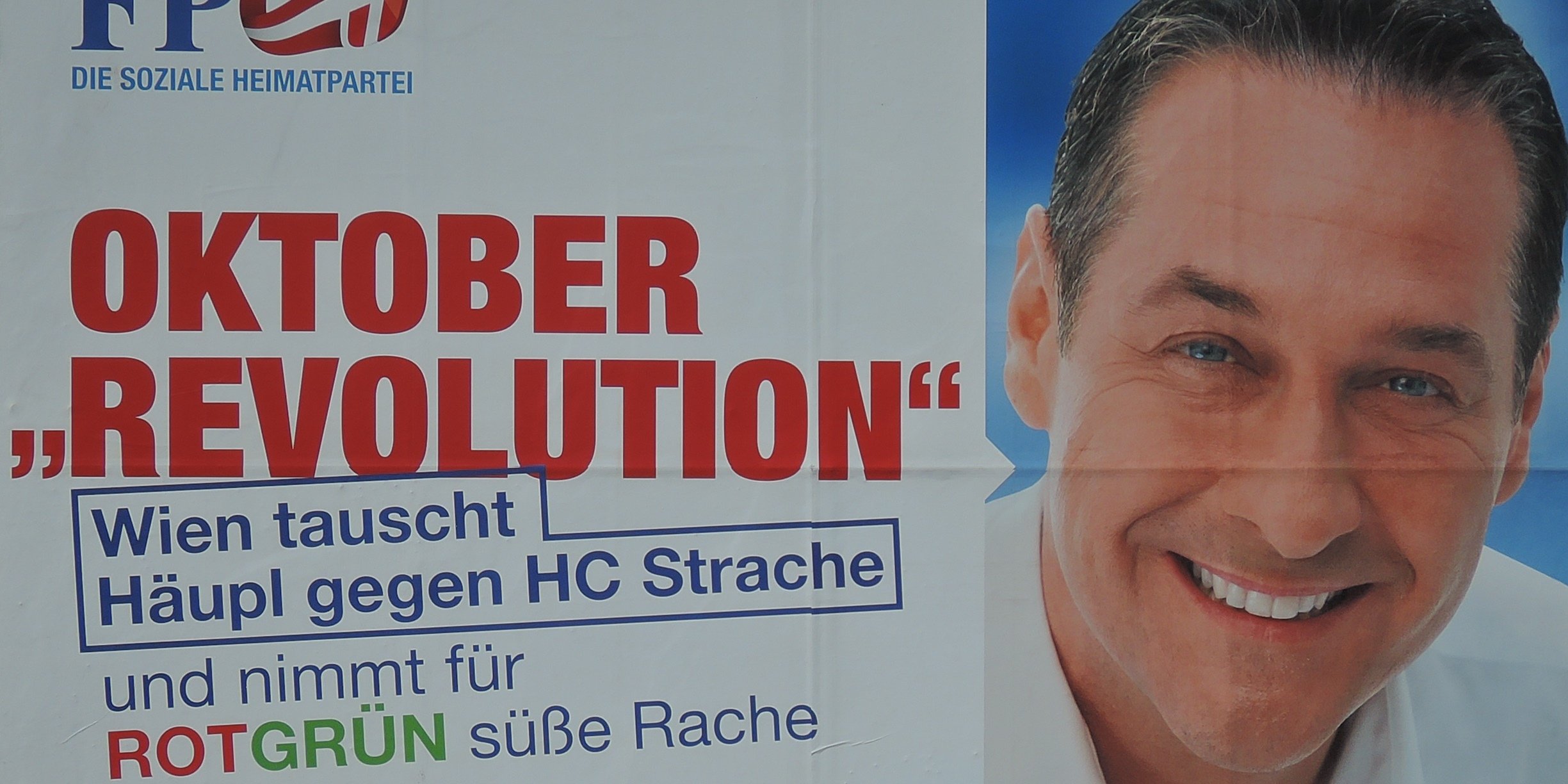 FPÖ Plakat Wien Wahl 2015 mit Slogan Oktober Revolution nebst grinsendem HC Strache
