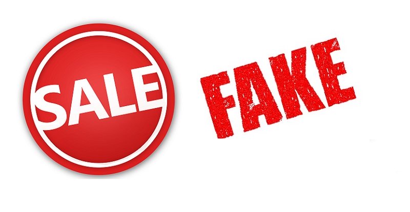 Fake und Sale zeichen auf weißem Hintergrund